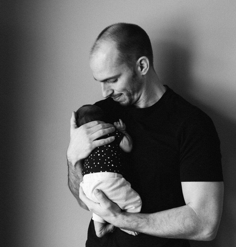 dad holding baby